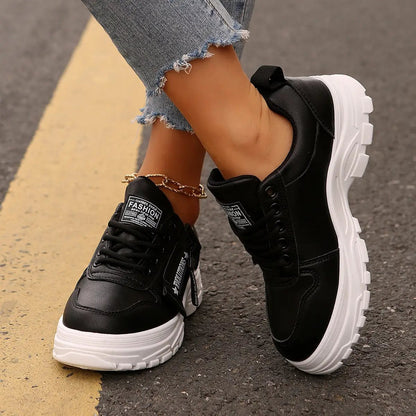 Lace-up women's sneakers with thick white sole and side-zip design, AdTec.