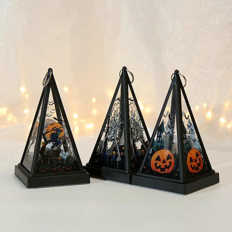 AdTec Halloween pumpkin lanterns set of 3 black metal pyramid nightlights with witch skulls and jack-o'-lanterns.
