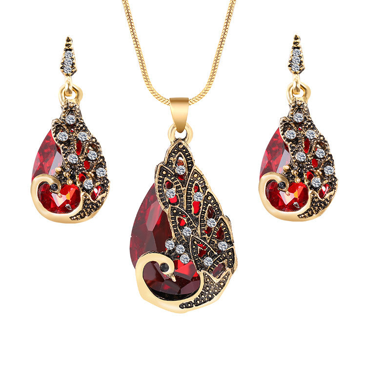 Juego de pendientes y collar con colgante