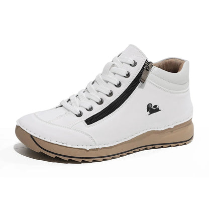 White women's flat casual dress shoes with laces and side zipper, tan sole