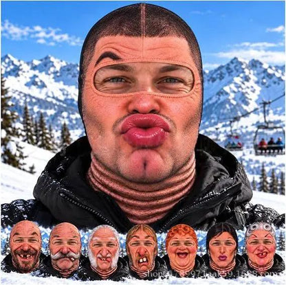 Realistic winter ski face mask balaclava in skin-tone with eye and mouth openings worn by man against snowy mountains.