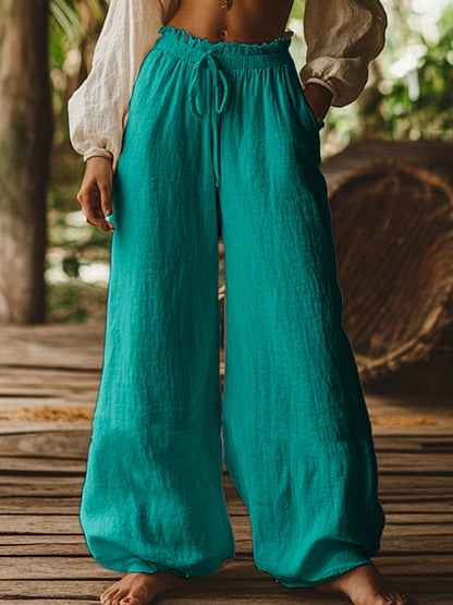 Pantalon ample décontracté de style artistique avec poches, cordon de serrage et taille élastique