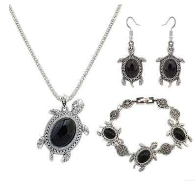 Nuevo conjunto de joyas de cuatro piezas con diseño de tortuga turquesa, cadena europea y americana, collar y pendientes a la moda.