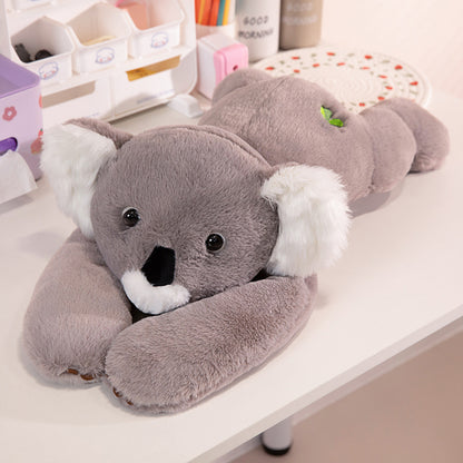 Peluche de dinosaure koala ours allongé