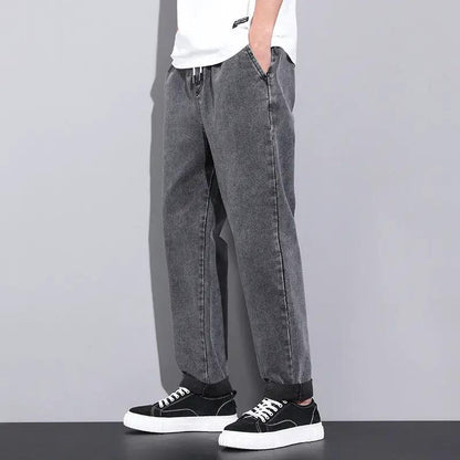 AdTec men's summer loose wide-leg denim jeans in washed gray with drawstring.