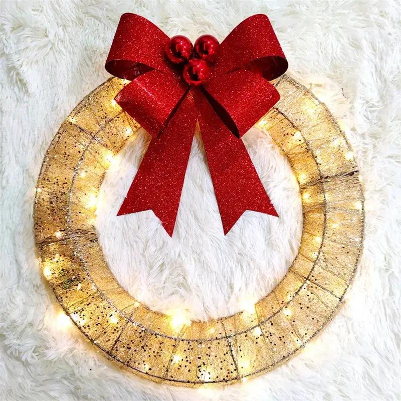 AdTec 50cm luminous LED Christmas wreath; gold glitter metal ring with red bow for front door decor