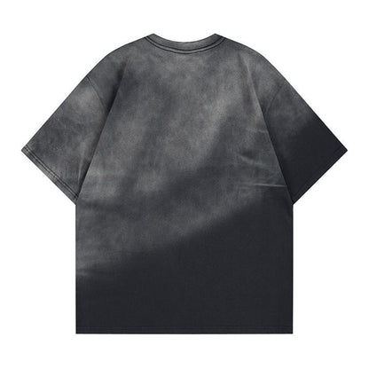 T-shirt à manches courtes avec lettrage estampé à chaud et teinture par pulvérisation