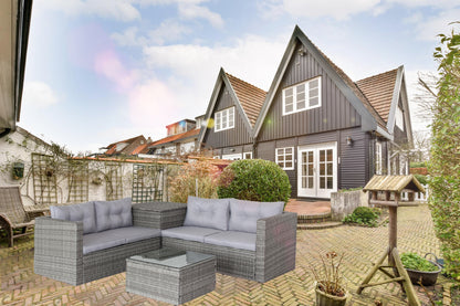 Juego de sofá de jardín de mimbre y ratán de 4 piezas con baúl de almacenamiento, gris