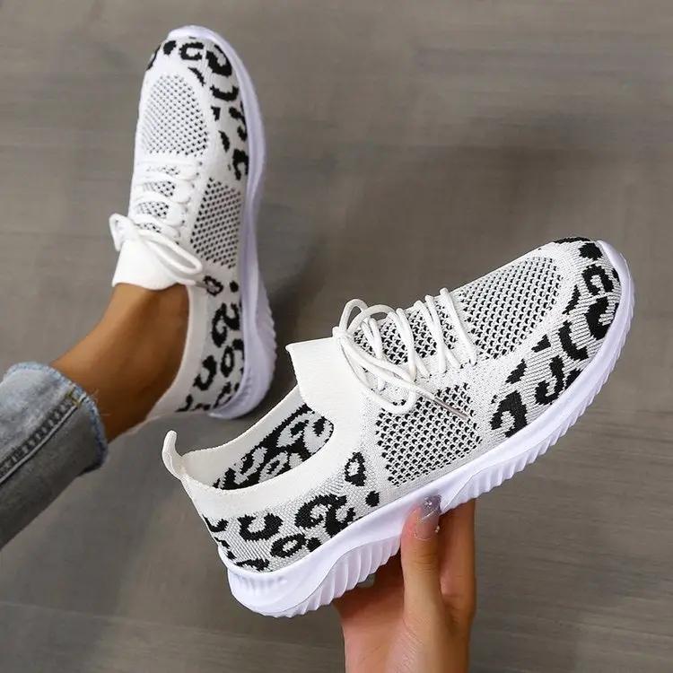 White leopard-print lace-up sneakers for women with knit mesh upper and chunky white sole