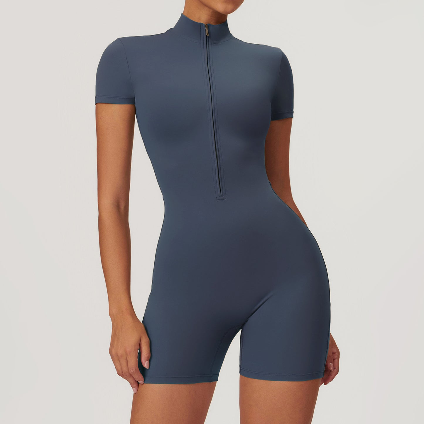 Combinaison de yoga zippée à manches courtes pour femme