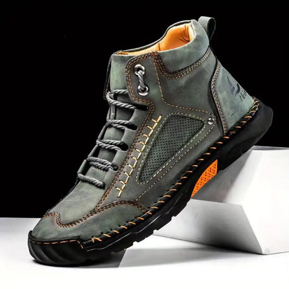 Aveline Handcrafted Ankle Boots by AdTec; gray-green suede with orange stitching and rugged rubber sole