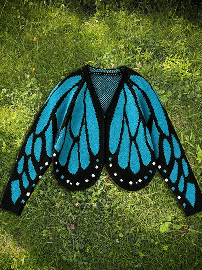 Women's butterfly knit cardigan sweater by AdTec in turquoise and black, long sleeve, open front.