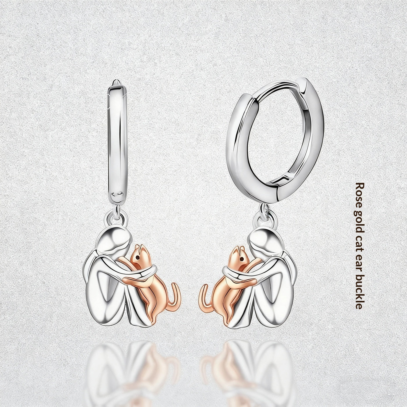 Ensemble de boucles d'oreilles Fillette et Chien s'enlaçant