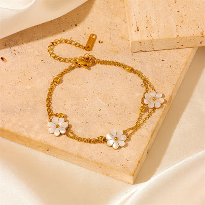 Bijoux fantaisie en acier inoxydable, collier double couche avec pendentif fleur marguerite et boucles d'oreilles.