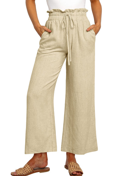 Pantalon large à taille élastique, lacets et coupe courte de couleur unie