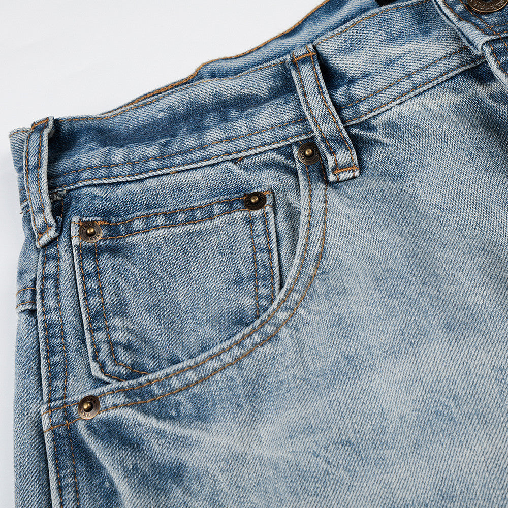 Pantalones de mezclilla blancos degradados desgastados