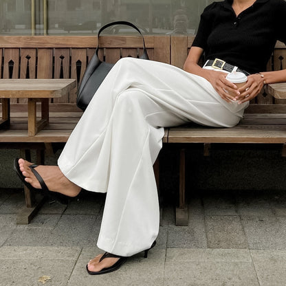 Pantalon blanc taille haute, coupe ample et décontractée