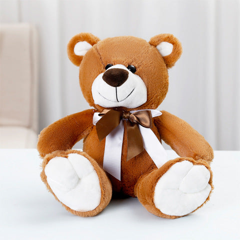Bonito oso de peluche de dibujos animados con pajarita
