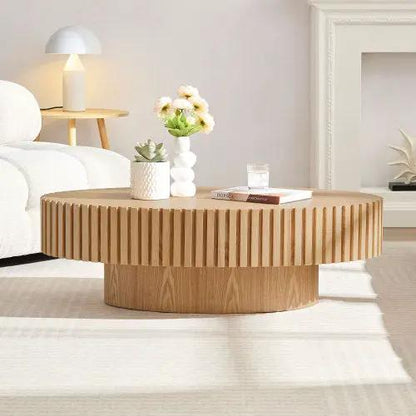 Modern Handmade Drum Coffee Table with a slatted circular drum body in natural wood.