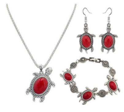 Nuevo conjunto de joyas de cuatro piezas con diseño de tortuga turquesa, cadena europea y americana, collar y pendientes a la moda.