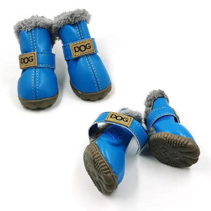Dog winter boots pair, blue with gray faux-fur lining and DOG patch on strap