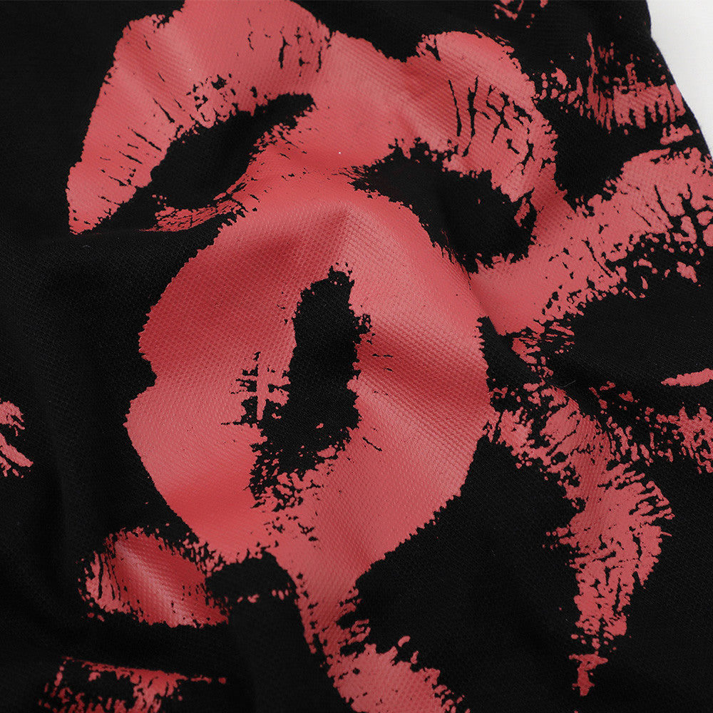 Polo holgado con estampado de labios