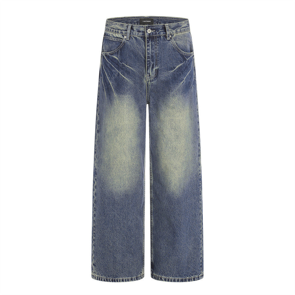 Pantalon jean délavé jambes larges droites avec blocs de couleur