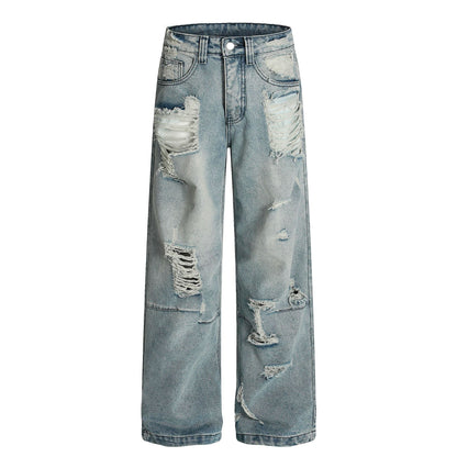 Distressed wide-leg jeans by eprolo, light-wash denim with heavy rips, unisex oversized