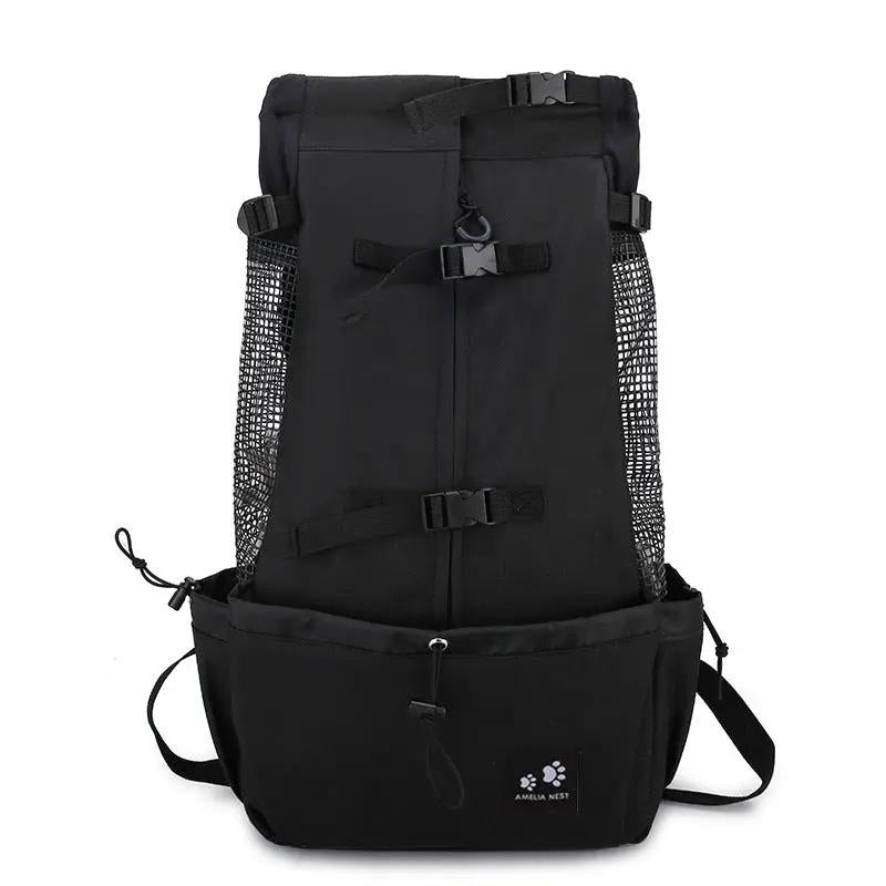 Black dog carrier backpack with mesh side panels and multiple adjustable buckles