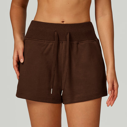 Short de sport molletonné taille haute avec cordon de serrage et poches pour l'extérieur