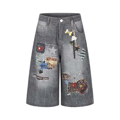 Shorts en jean délavé à motif imprimé