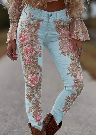 Pantalon en faux jean fleuri et coloré pour femme