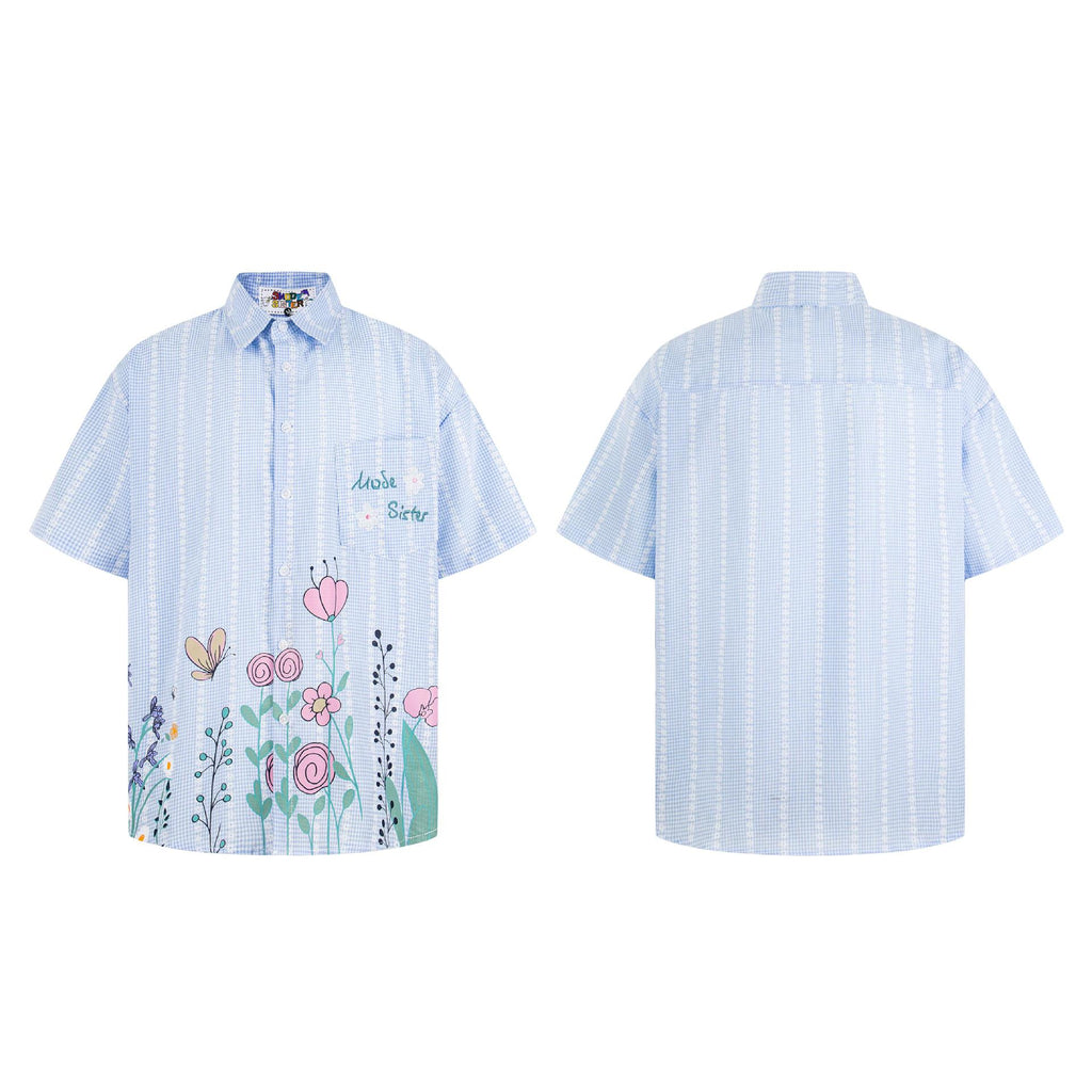 Camisa de manga corta a cuadros con grafiti floral