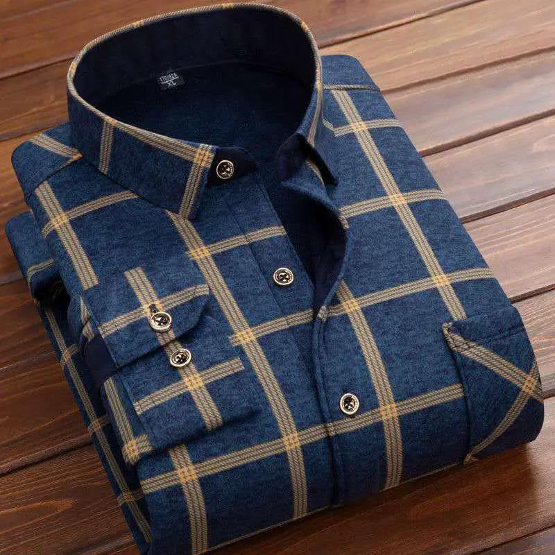Mens fleece-lined blue plaid flannel shirt with tan checks, button-front, folded.