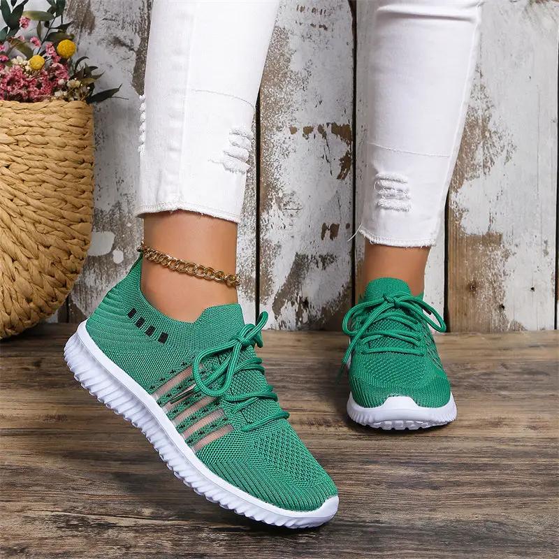 AdTec green mesh lace-up sneakers with white sole for walking and running