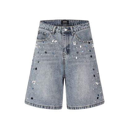 Short en jean lavé orné de perles fait à la main