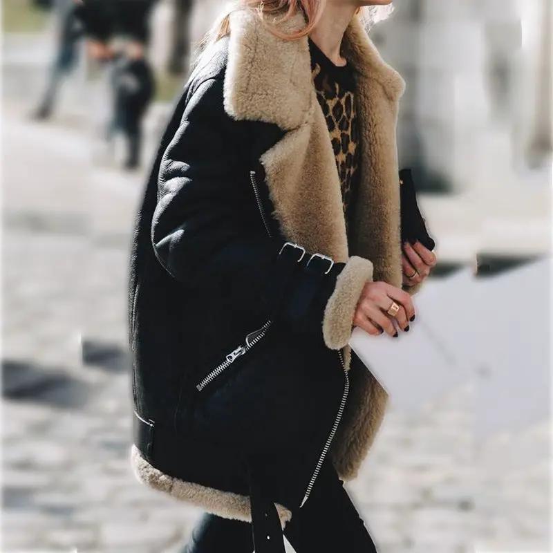 Suede leather jacket with tan lamb wool lining and black exterior