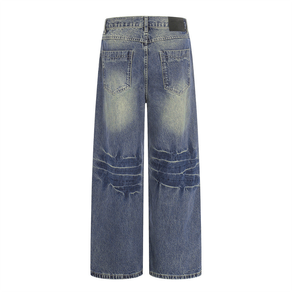Pantalon jean délavé jambes larges droites avec blocs de couleur