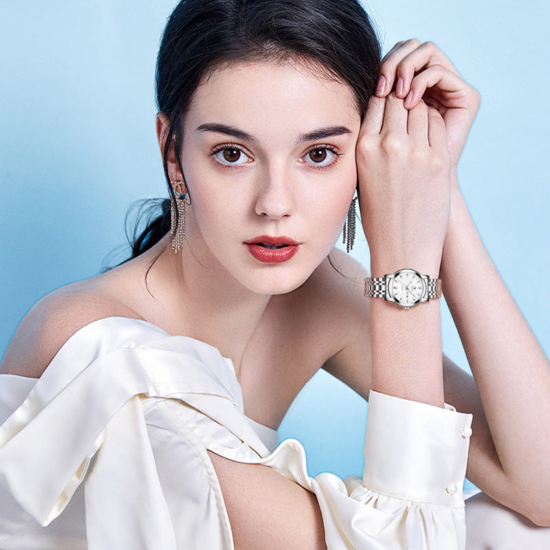 Pequeño y exquisito reloj de cuarzo impermeable luminoso sencillo para mujer