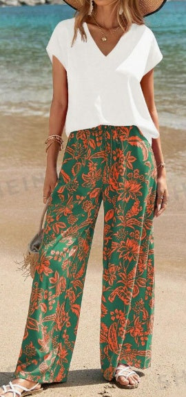 Conjunto de dos piezas de top liso con cuello de pico y pantalones con estampado botánico para mujer