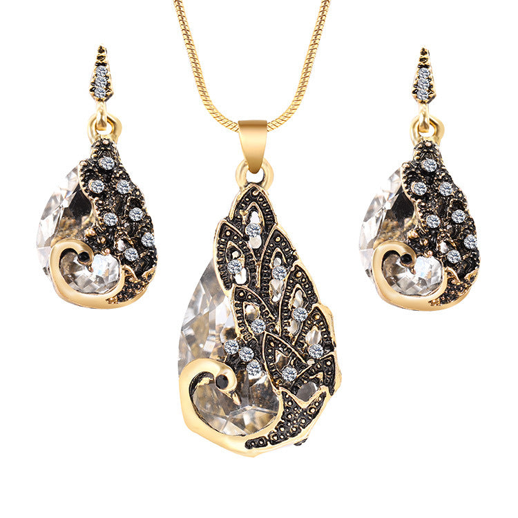 Ensemble collier pendentif et boucles d'oreilles