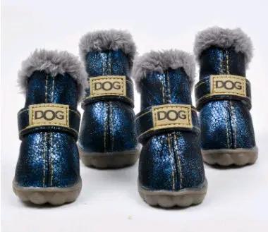 Dog snow boots; four blue boots with gray faux-fur trim and beige soles, DOG logo straps