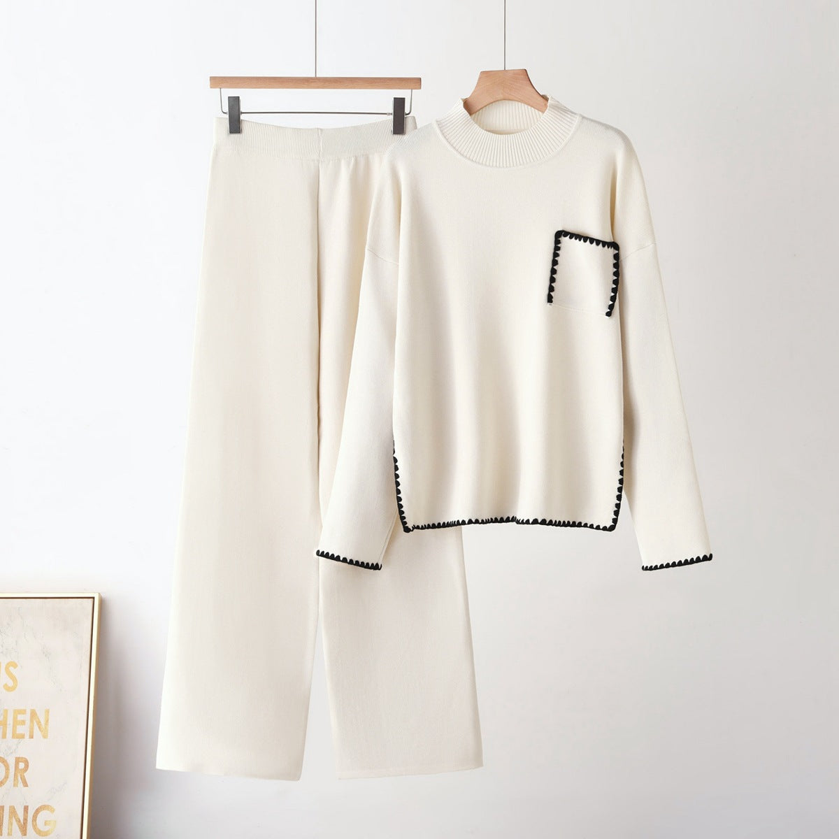 Elevate your everyday style with this sophisticated two-piece knit set.