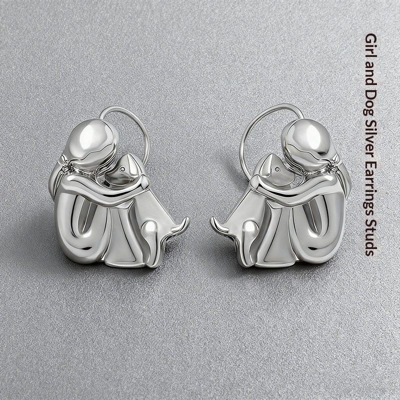 Ensemble de boucles d'oreilles Fillette et Chien s'enlaçant