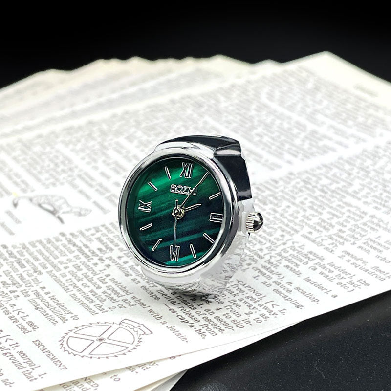 Mini anillo creativo reloj de cuarzo de dedo