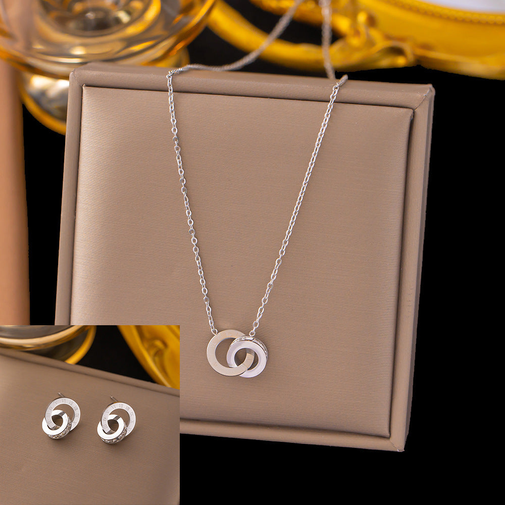 Juego de joyas de acero inoxidable para mujer: collar y pendientes