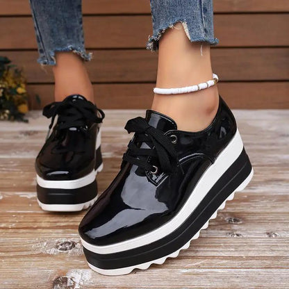 Womens lace-up square-toe patent leather platform wedge heels, black patent with white sole, 2 shoes shown