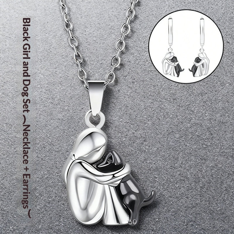 Ensemble de boucles d'oreilles Fillette et Chien s'enlaçant