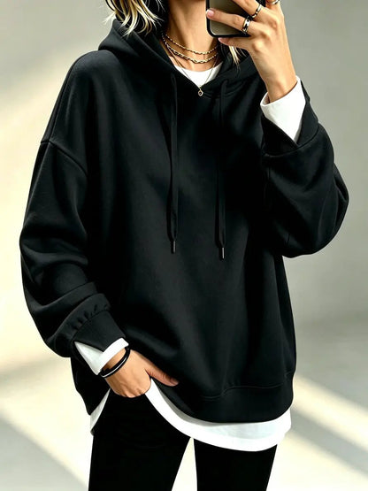 Plus-size loose-fit long-sleeve black hoodie by AdTec with drawstring hood