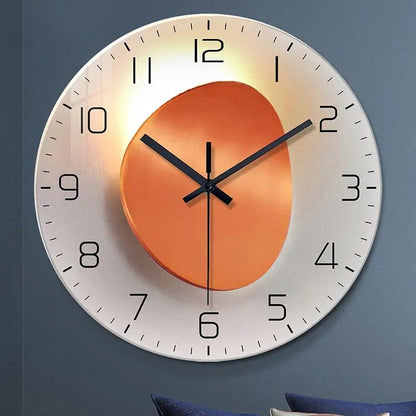 Wall-mounted decorative clock by AdTec with a silver outer dial and copper inner disk.